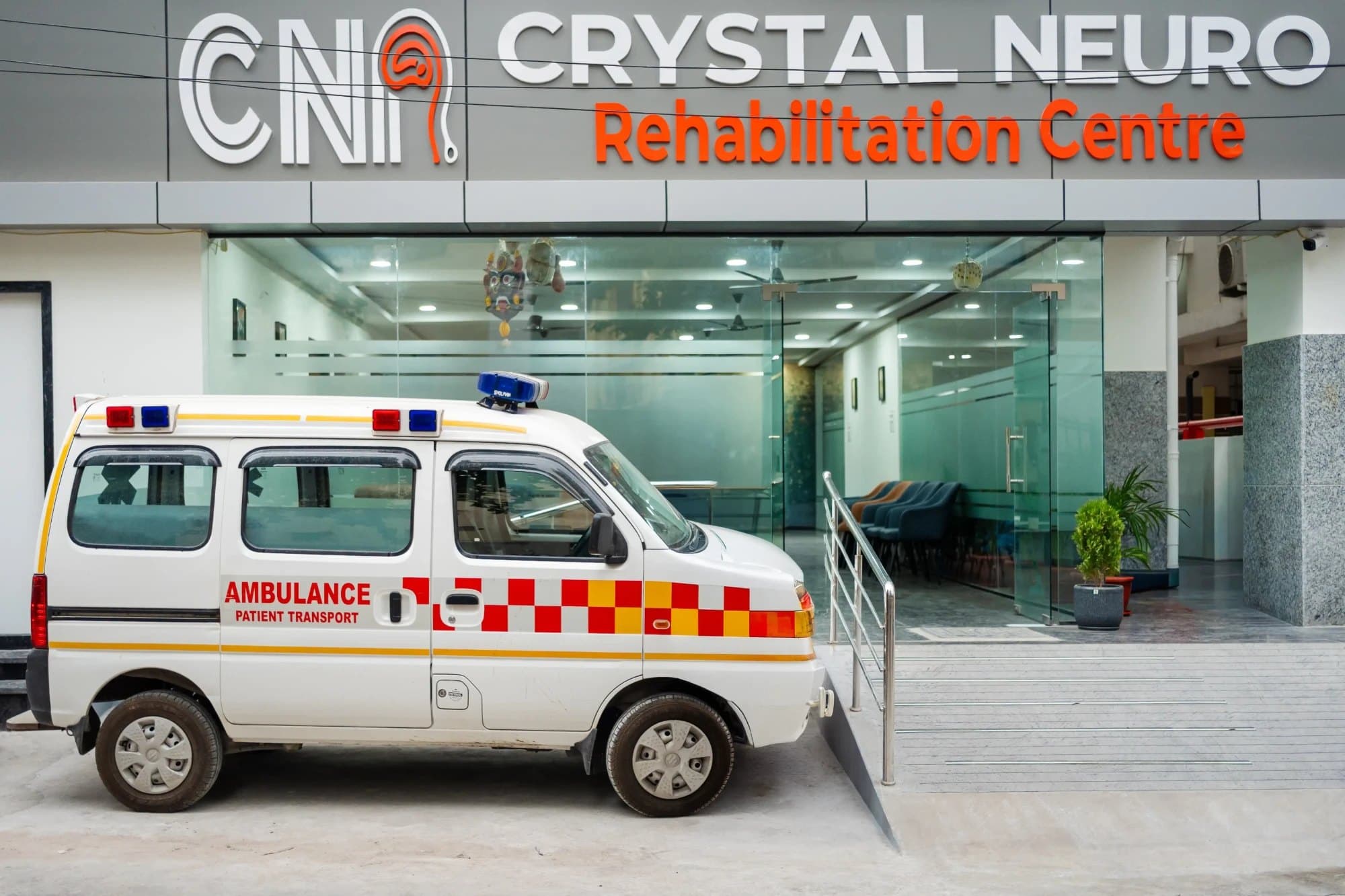 CNR Crystal Neuro Rehabilitation Centre entrance with patient-transport ambulance, Dilsukhnagar, Hyderabad